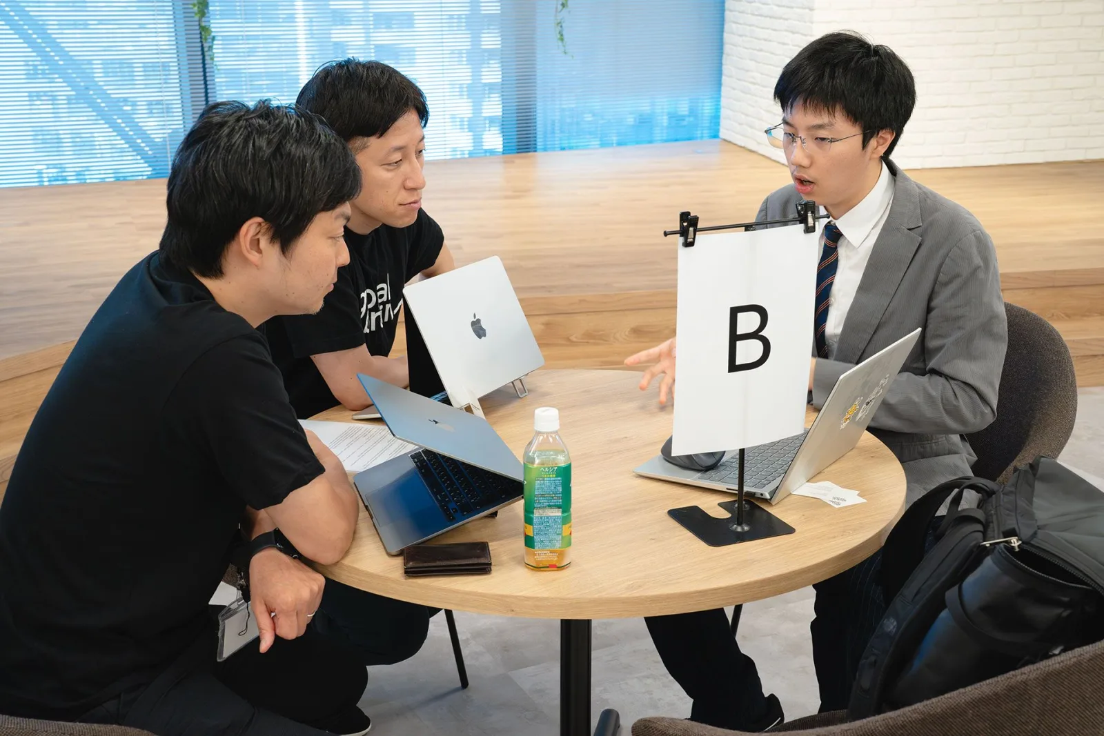 Howard Chan pitching ElevateOS to Global Brain in Tokyo